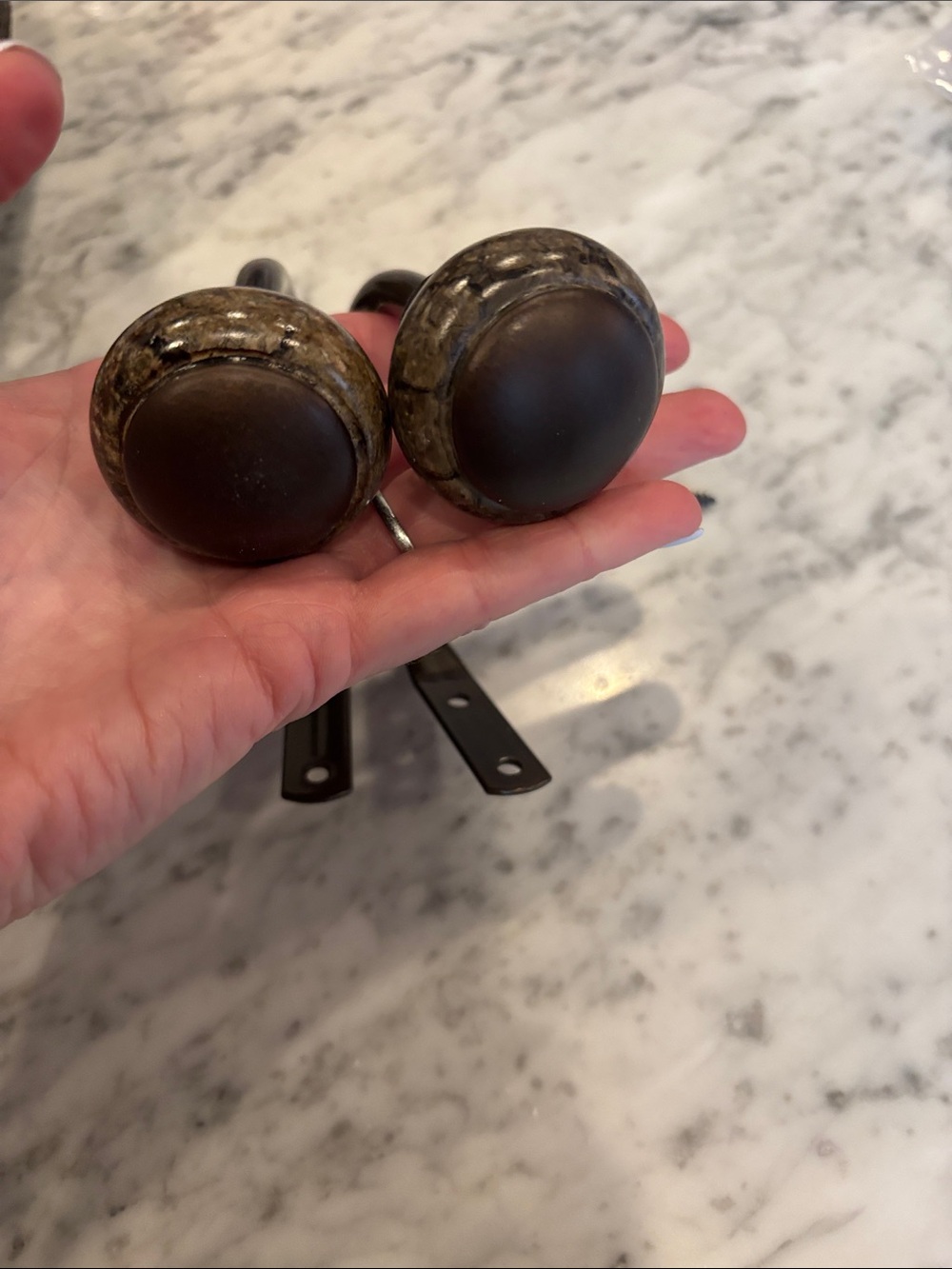 Round Brown Ceramic Curtain Hooks- Set of 2 for $6.  4 sets available